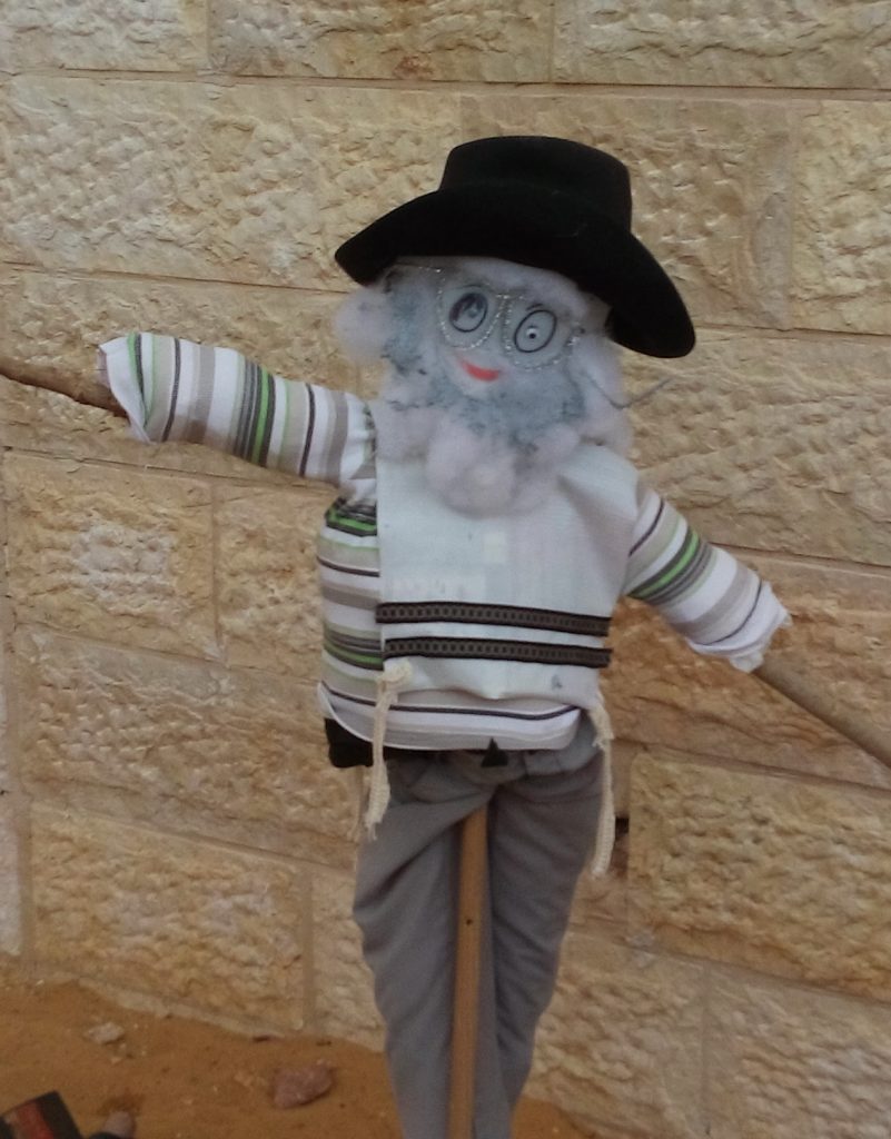 Rabbi Scarecrow protecting the crops